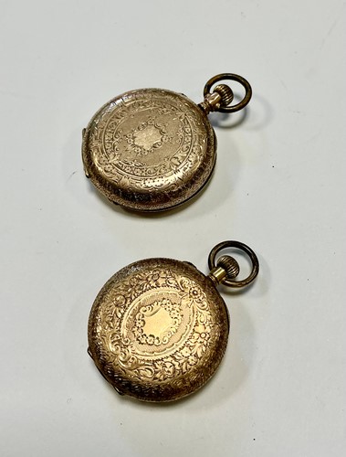 Lot 358 - A half hunter pocket watch stamped '9K', gross...