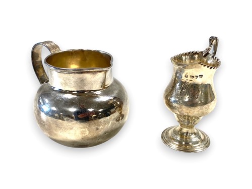 Lot 155 - A George III silver helmet shaped jug