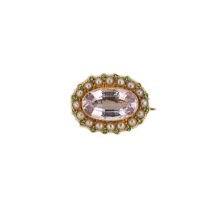 Lot 14 - A pink topaz, split pearl and demantoid garnet brooch