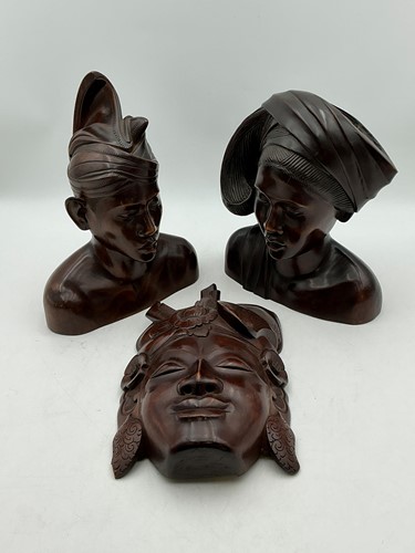 Lot 149 - 2 Balinese carved wood busts and one mask