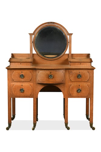 Lot 174 - Attributed to Arthur Simpson of Kendal, an Arts & Crafts oak dressing table