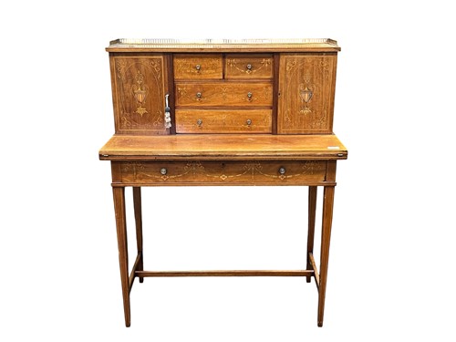 Lot 632 - A writing desk with neo-classical urn inlaid...