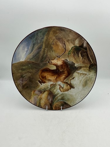 Lot 243 - A large Worcester charger painted with a stag...