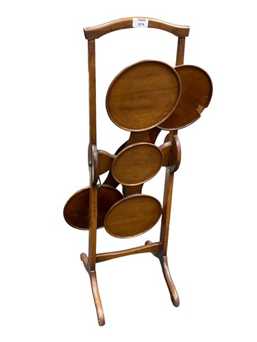 Lot 619 - A vintage mahogany monoplane folding cake...