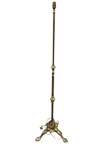 Lot 316 - An Edwardian brass adjustable standard lamp...