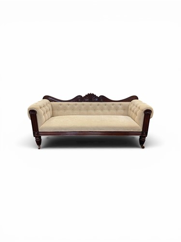 Lot 391 - A William IV carved mahogany settee, the...