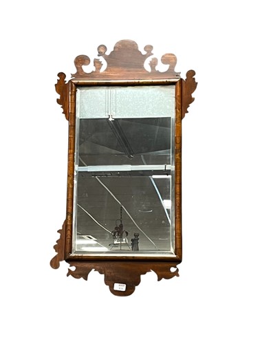 Lot 636 - A mahogany fret wall mirror, with rectangular...