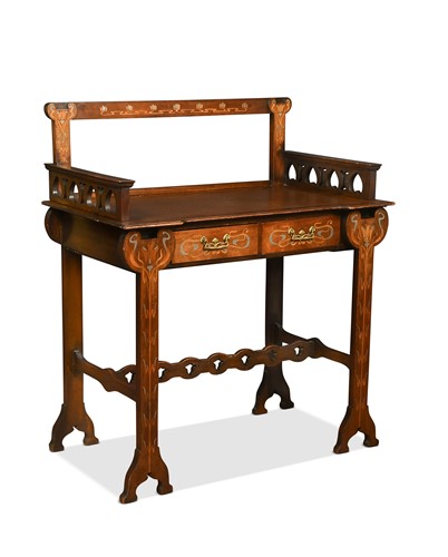 Lot 157 - In the manner of Shapland & Petter, an inlaid oak writing table