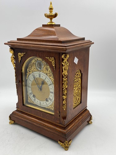 Lot 185 - A George III style oak bracket clock with gilt...