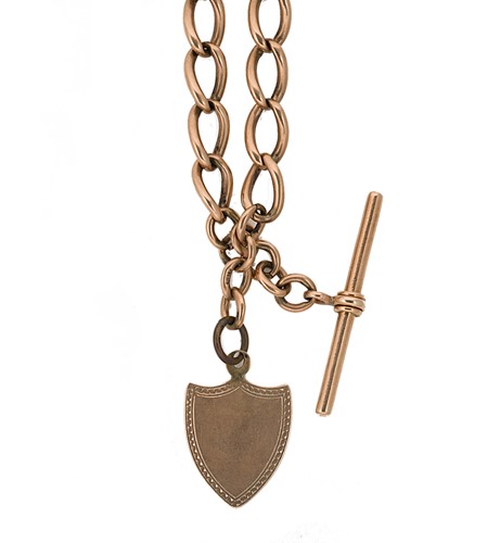 Lot 240 - A curb link watch chain with a shield fob and 'T' bar
