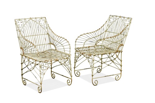 Lot 710 - A pair of white-painted wirework garden chairs, 20th century