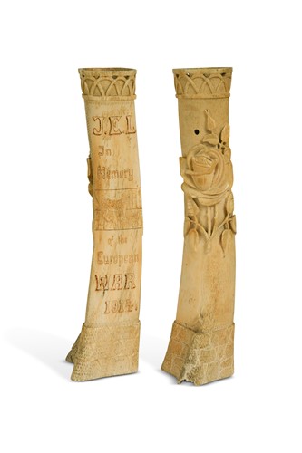 Lot 691 - A pair of First World War Isle of Man Prisoner of War bone carvings