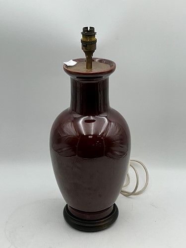 Lot 43 - A Chinese sang de boeuf ceramic table lamp...