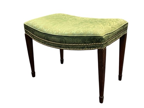 Lot 545 - A George III style mahogany bow fronted stool,...