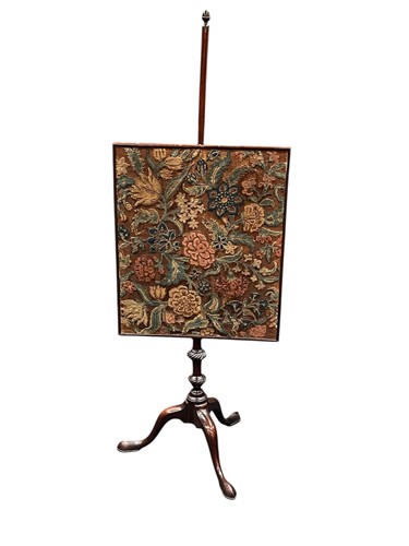 Lot 540 - A George III style mahogany pole screen