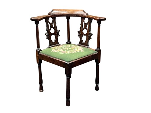 Lot 542 - A George III mahogany corner chair, with...