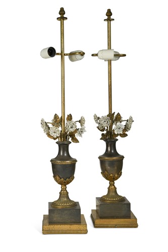 Lot 679 - A pair of metal lamps with porcelain flowers, late 19th century