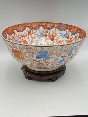 Lot 38 - Imari style bowl on lotus carved wood stand,...