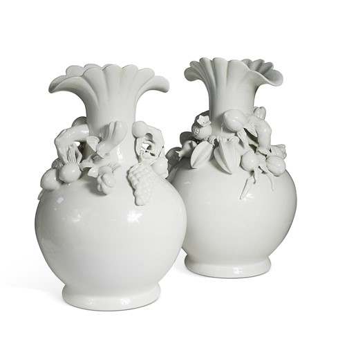 Lot 602 - A large pair of oriental style white glaze bottle vases, 20th century