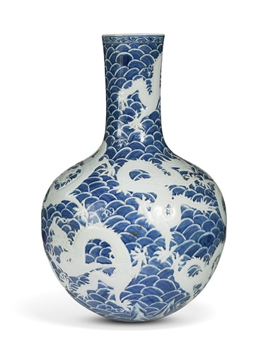Lot 525 - An Asian blue and white dragon bottle vase, 20th century
