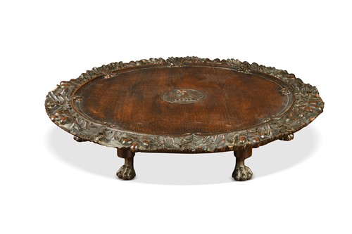 Lot 395 - A carved oak lazy susan, 19th century
