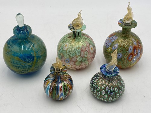 Lot 42 - Five glass scent bottles to include, four...