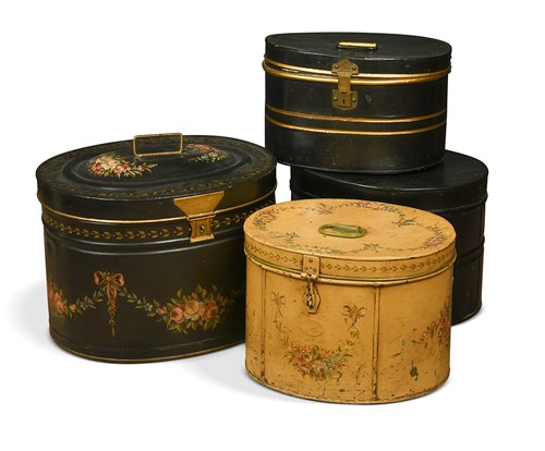 Lot 450 - A collection of four tole-painted hat boxes, early 20th century