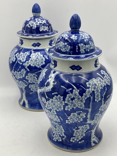 Lot 47 - A pair of Chinese blue and white baluster...