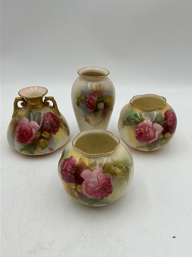 Lot 30 - A pair of Royal Worcester ivory ground wrythen...