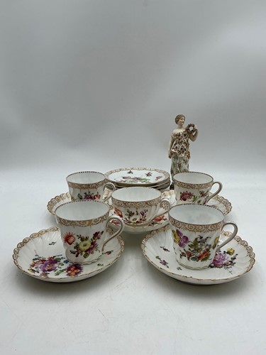 Lot 3 - A part Dresden tea and coffee service painted...