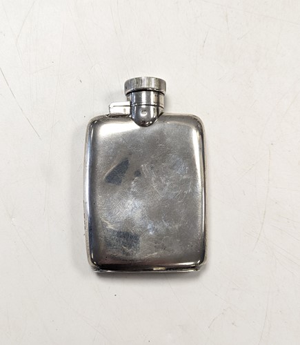 Lot 110 - A silver hip flask
