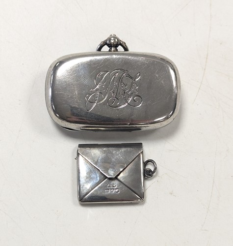Lot 112 - A sovereign case, together with a novelty stamp case