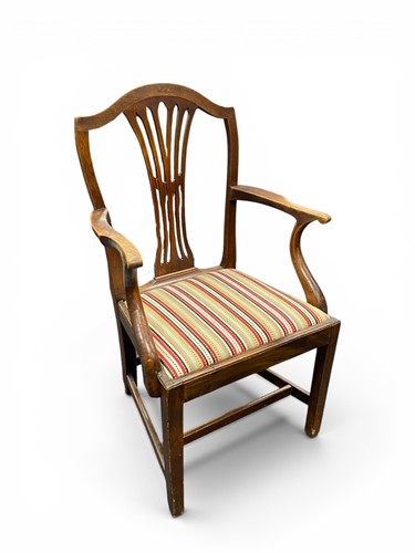 Lot 375 - An elm armchair, 19th century, with drop in...
