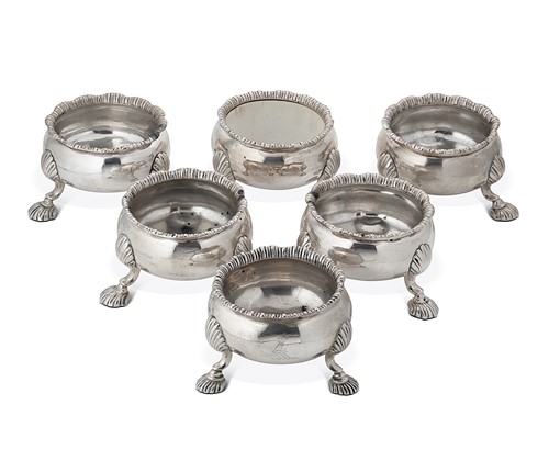 Lot 318 - A composed set of six George II silver cauldron salts