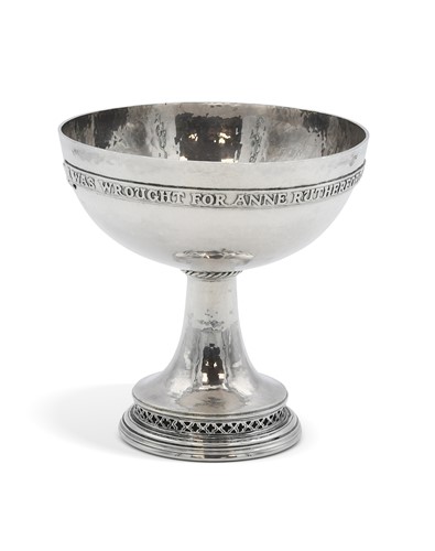 Lot 101 - Omar Ramsden (1873-1939), an Arts & Crafts planished silver goblet