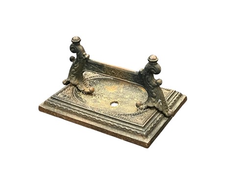 Lot 693 - A cast iron boot scraper 20 x 36 x 26cm
