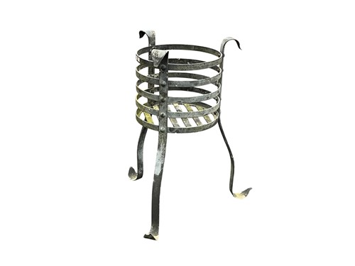 Lot 691 - An Arts & Crafts style metal plant stand on...