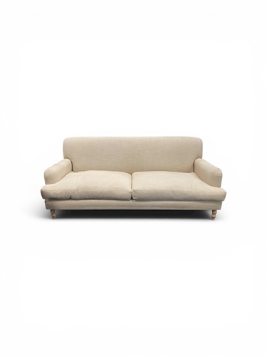 Lot 371 - A large dark cream linen upholstered three...