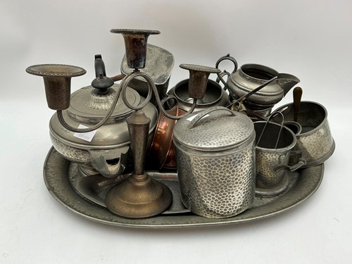Lot 247 - Various items of hammered pewter to include an...
