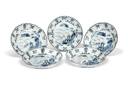 Lot 77 - A set of five Japanese blue and white porcelain Delft style plates, 18th century