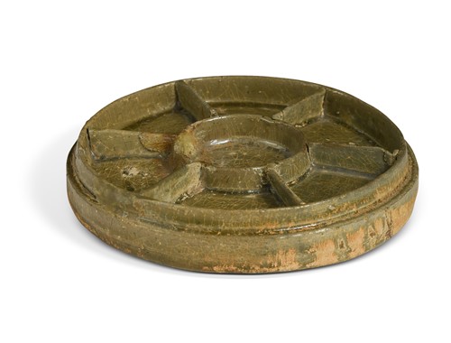 Lot 13 - A Chinese Yue celadon divided offering tray, 4th century