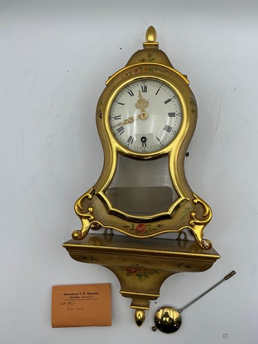 Lot 216 - A decorative bracket clock by Zenith,...
