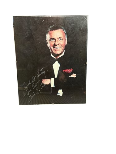 Lot 140 - A colour photograph portrait of Frank Sinatra...