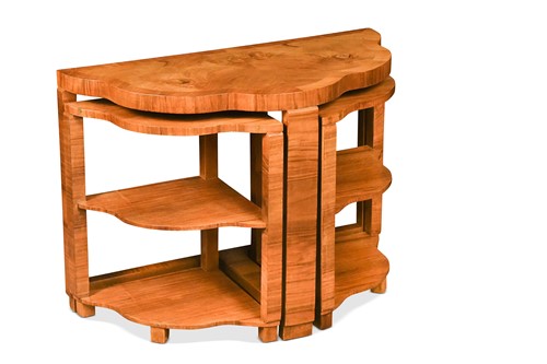 Lot 198 - An Art Deco walnut nest of 'cloud' tables by Harry and Lou Epstein, circa 1930