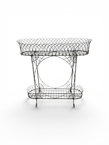 Lot 437 - A decorative wirework two tier garden planter...