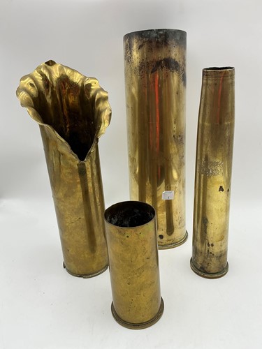 Lot 203 - Four 20th century trench art brass shell cases,...