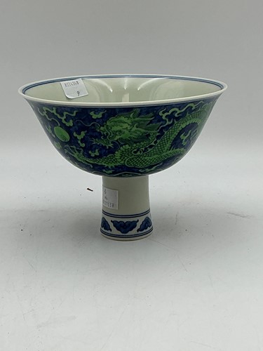 Lot 60 - A Chinese porcelain stem bowl, the exterior...