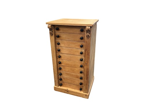 Lot 510 - A Victorian pine wellington chest, the twin...
