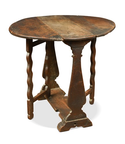 Lot 427 - A William & Mary oak gateleg occasional table