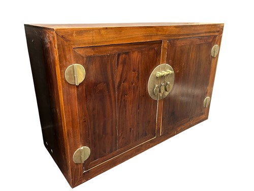 Lot 559 - A Chinese two door low cupboard 89 x 140 x 53cm